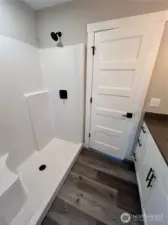 Second primary suite also has a step-in shower. *previous build