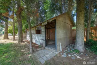 Wood storage OR fun hot tub space. Building has retractable roof.& electrical. 24 ft. x 9 ft.