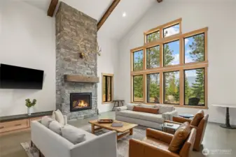 Floor to ceiling stone fireplace