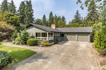 Welcome to this beautifully maintained and updated mid-century modern home!