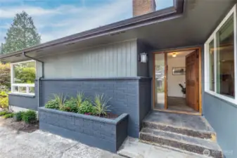 Covered entry and raised planter bed