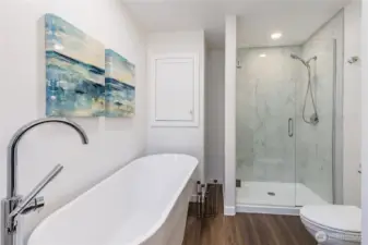 Luxurious 6' freestanding tub in the primary bath