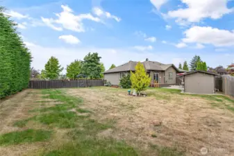 Backyard facing west with side gate entry to the front.