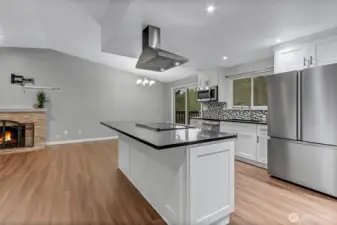 Amazing kitchen remodel including stainless steel appliances, Quartz counters, flooring, fixtures and a walk-in pantry