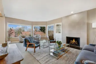 Spacious, view living room with wood burning fireplace at The Borealis