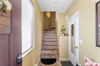 Welcome home, enter through your front door or via the garage.