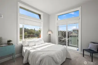 Light pours into this generous sized primary suite with views of the south