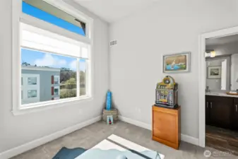 Pocket door leads to a full-bath making this the ideal guest suite.