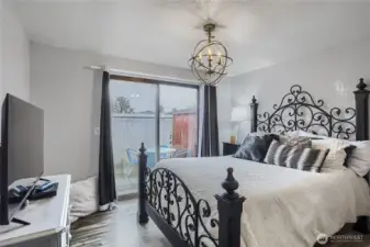 Spacious Primary bedroom with patio for private outdoor enjoyment