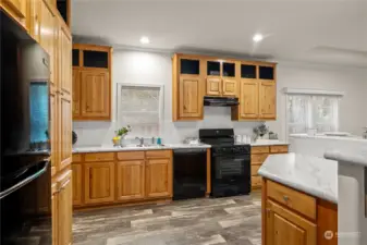 Brand new appliances and knotty pine cabinets