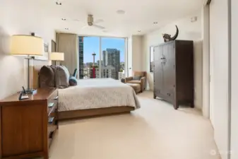 Second Primary Bedroom Ensuite is spacious with views of the Space Needle and City. Lutron Blinds, blackout Drapes, large Closet, Ceiling Fan and custom Lighting.