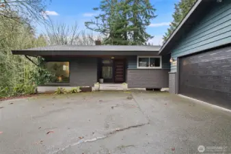 New exterior paint gives this 1961 home a modern vibe.