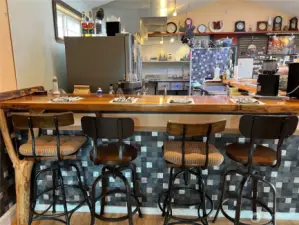 Bar seating is available.  Conversations with the Chef are always interesting.