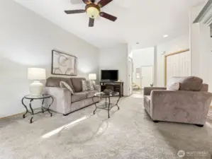 Newer flooring and fresh paint throughout! The ceiling fan will keep you cool - or warm, if you have your toasty fireplace on!