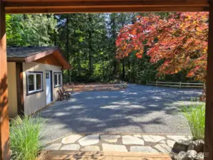 View of shed and driveway parking from the foyer/entry.