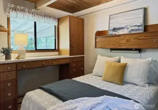 Main bedroom with built-ins.