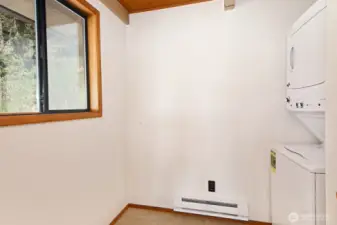 Laundry room that was a small third bedroom. If you need this space for another use, laundry hook ups are in the basement still.
