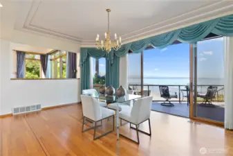 Formal dining room with slider to lower deck.