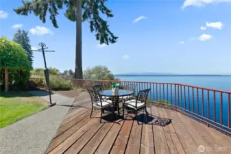 Wood patio has one of the best views with two ferries & Mt Baker