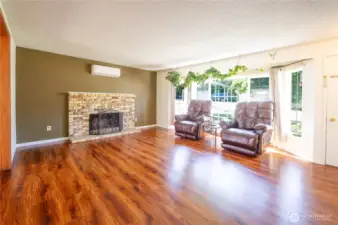 Brick fireplace & mini splits for all season comfort