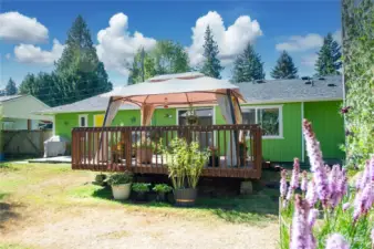 Huge, fully fenced, level backyard with 20' x 16' deck & gazebo.