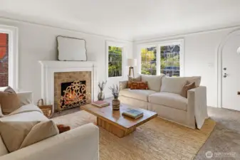 Large formal living room with elegant period details and tons of natural light