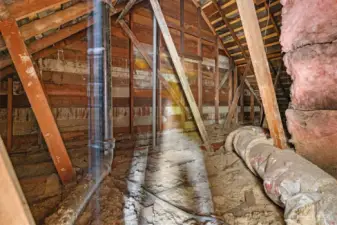Potential to add primary suite in unfinished attic area.