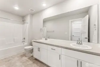 Photos are of lot 42 at Star Lake Crossing.