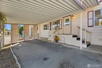View of covered entry and stairs.