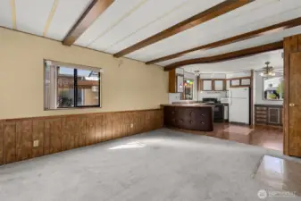 spacious living room with plenty of natural light.