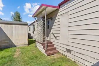 Additional door on back side of house.