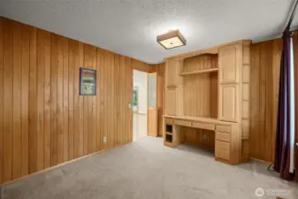 Multi-Functional Bedroom with Workspace and Added Storage