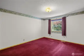 Generously Sized Bedroom with Plenty of Room to Relax