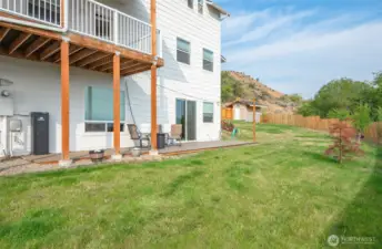 Deck off entertainment area.  Great yard to play!