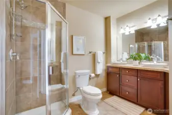 Ensuite bathrooms with dual vanities & heated flooring.