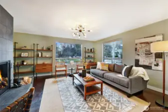 Large light filled living room the wood fireplace