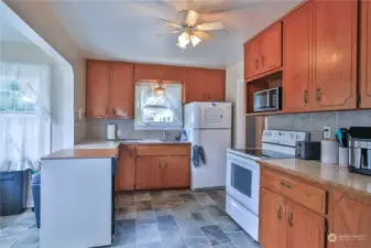 Large kitchen with eat-in kitchen area.