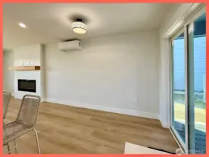 Dining area with door leading to the covered Trex deck