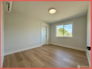 Second bedroom across the hallway from the guest bathroom.