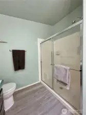 Large walk-in shower with built in seating