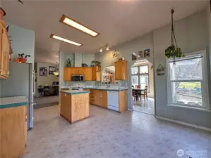 Large kitchen with island, newer SS refrigerator & microwave
