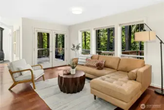 The great room is open, light and airy and offers multiple living options. All of the living spaces have Cherry hardwood floors.
