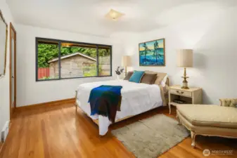 Primary bedroom with attached bathroom