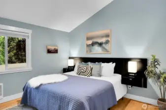 Primary bedroom easily fits a king-size bed