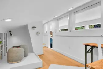 Light and bright, room for your desk PLUS comfy sitting room for reading or playing