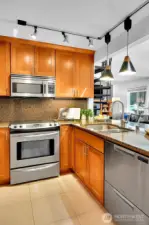 Lots of storage in the kitchen, and fresh tile floors