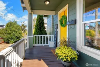 Charming front porch—ideal for morning coffee, evening wine, or just waving to the neighbors.