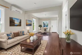 Virtually staged to showcase how this open living/dining space shines with comfort and style.