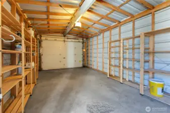 Garage interior - space for parking & shelving for even more storage.
