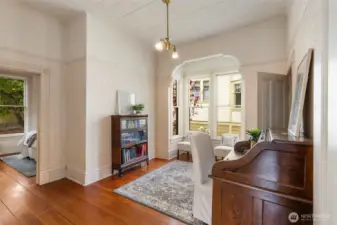 Elegant, curved archways and tall windows.